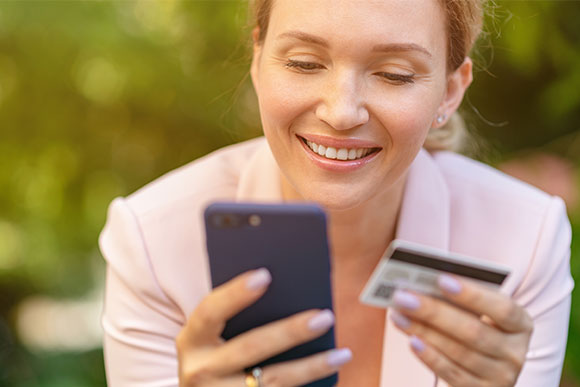 woman using the American Federal Bank mobile app