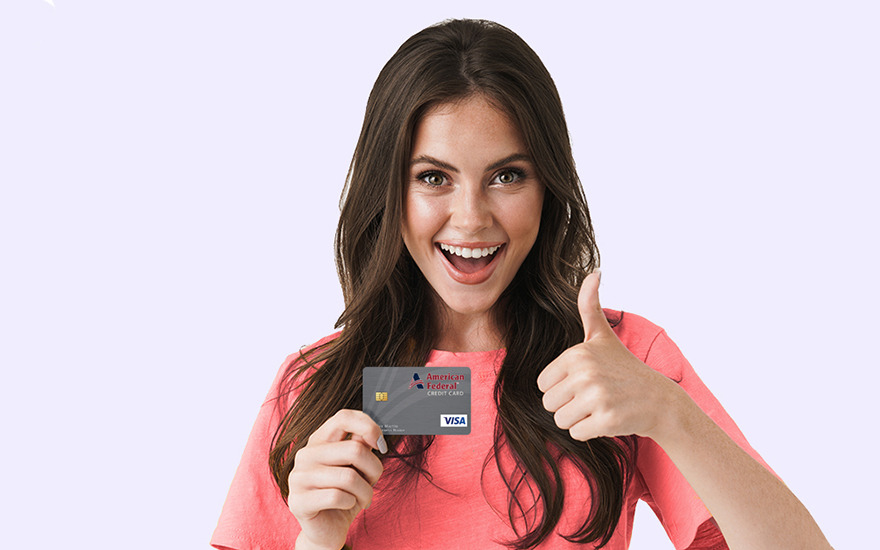 Girl holding credit card