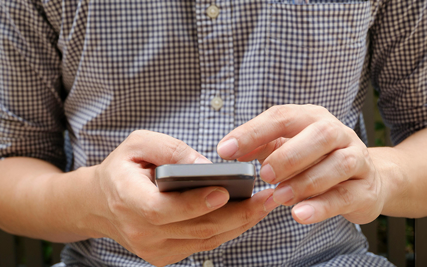 Man holding iPhone