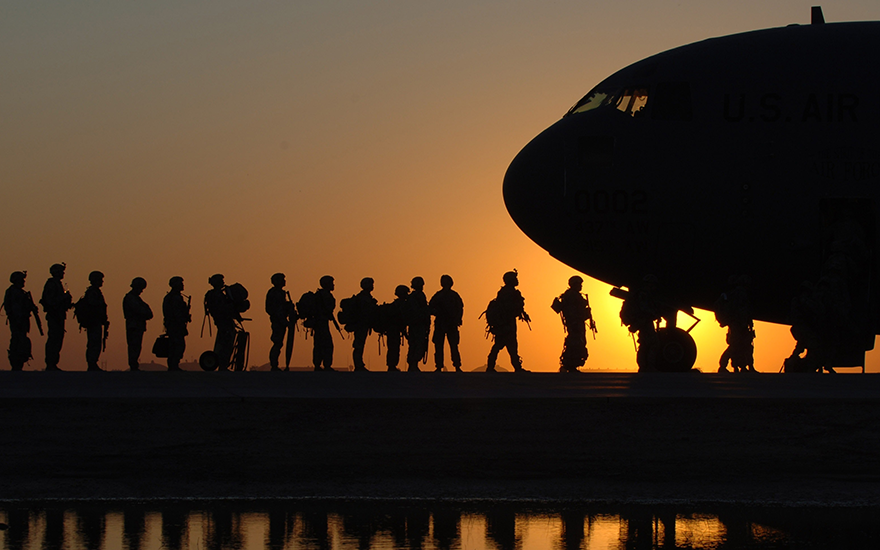 Soldiers boarding aircraft